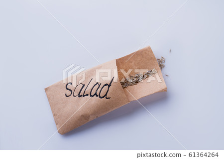 Oat grains in a package. 61364264