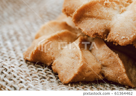 Close-up macro cookies baking on wooden bowl Close-up macro cookies baking on wooden bowl 61364462