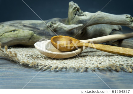 Rustic wooden utensils in a kitchen still life 61364827