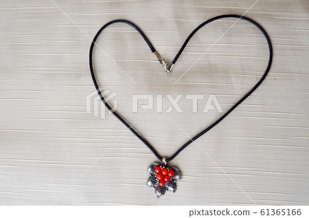 Women's necklace with a silver pendant Women's necklace with a silver pendant 61365166