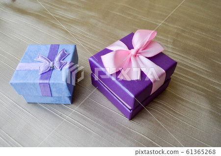 Gift, beautiful, festive boxes blue and purple  61365268