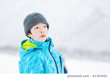Kids enjoying winter 61365682