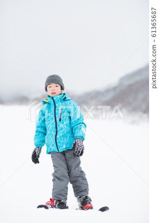 Kids enjoying winter Kids enjoying winter 61365687