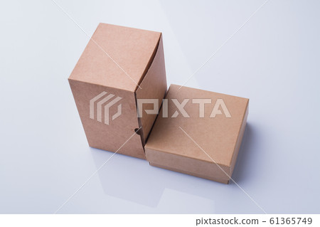 Small and tall cardboard boxes. Small and tall cardboard boxes. 61365749
