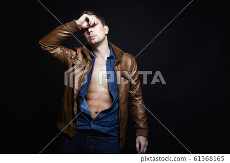 Man in leather coat. stylish sexy Handsome Boy 61368165