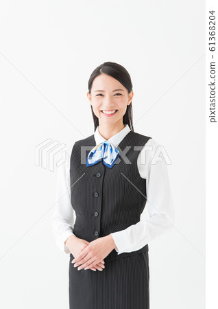 Working woman in uniform (white background vertical position) Working woman in uniform (white background vertical position) 61368204