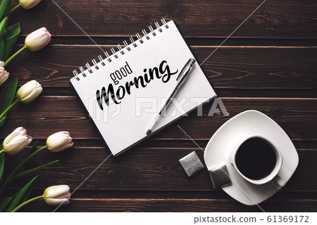 Greeting card with the inscription Good Morning. White tulips and a Cup of coffee Greeting card with the inscription Good Morning. White tulips and a Cup of coffee 61369172