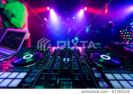 professional DJ music mixer at a party at an electronic concert 61369226