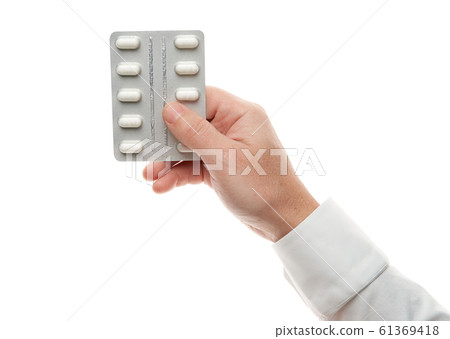 Man hand with pills blister isolated on white Man hand with pills blister isolated on white 61369418