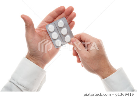 Man hand with pills blister isolated on white Man hand with pills blister isolated on white 61369419