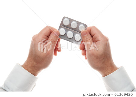 Man hand with pills blister isolated on white Man hand with pills blister isolated on white 61369420