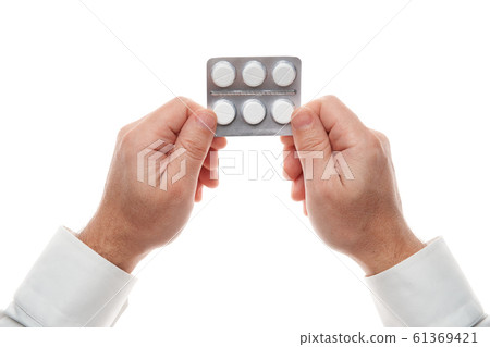 Man hand with pills blister isolated on white Man hand with pills blister isolated on white 61369421