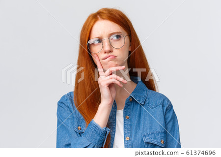Close-up thoughtful and focused, creative female freelancer, student want work part-time, thinking opportunities, look away smirk and frowning pondering, make decision, stand white background Close-up thoughtful and focused, creative female freelancer, student want work part-time, thinking opportunities, look away smirk and frowning pondering, make decision, stand white background 61374696