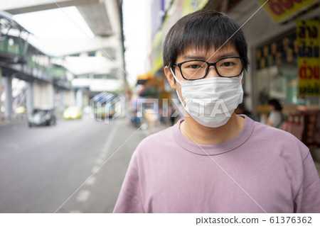 HandsomeMan wearing face mask protect filter 61376362