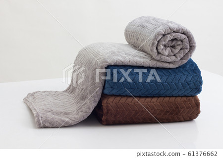 stack of folded soft blankets stack of folded soft blankets 61376662