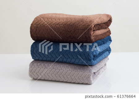 stack of folded soft blankets isolated stack of folded soft blankets isolated 61376664