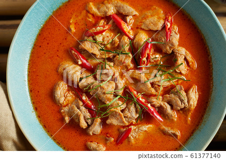 Dried red pork coconut curry, Thai cuisine. 61377140