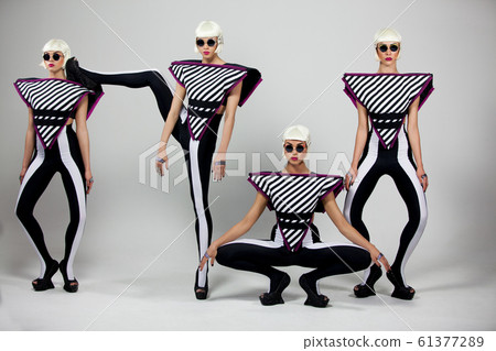 Dancing fashion girls on white background 5k 61377289