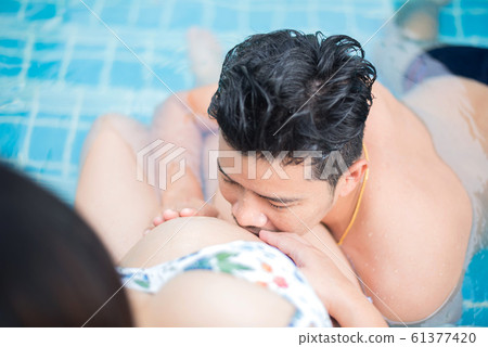 Asian pregnant woman. Mom and newborn baby. Asian pregnant woman. Mom and newborn baby. 61377420