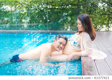 Asian pregnant woman. Mom and newborn baby.  61377421