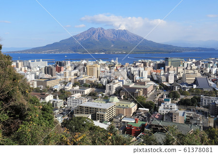 Sakurajima and the streets of Kagoshima city Sakurajima and the streets of Kagoshima city 61378081