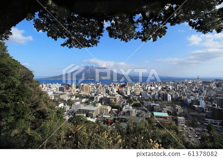Sakurajima and the streets of Kagoshima city Sakurajima and the streets of Kagoshima city 61378082