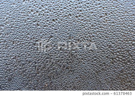 Water droplets on window glass with condensation 61378463