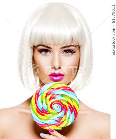 Face of a beautiful  girl with bob hairstyle  and 61379011