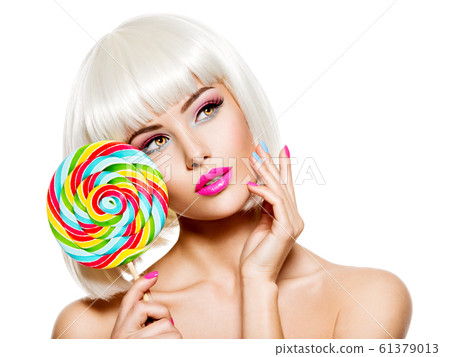 Face of a beautiful  girl with pink eye make-up 61379013