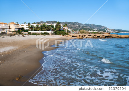Playa del Moro beach in Alcossebre, Spain. Playa del Moro beach in Alcossebre, Spain. 61379204