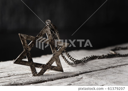 the star of david on a rustic wooden surface the star of david on a rustic wooden surface 61379207
