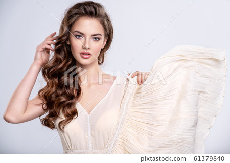 Portrait of a beautiful woman with a long hair in Portrait of a beautiful woman with a long hair in 61379840