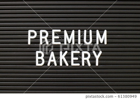 Black color felt letter board with white alphabet in word premium bakery 61380949
