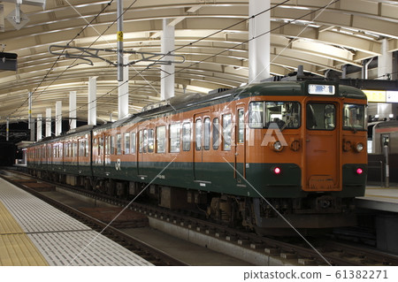 The Echigo Line near Series 115 Series Shonan Color (Niigata Station) 61382271