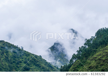 Picture of Himalayas mountains covered with fog Picture of Himalayas mountains covered with fog 61383292