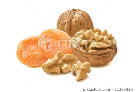 Walnuts and dry apricots isolated on white background 61383420