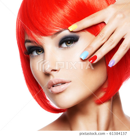 Face of a beautiful  girl with brown eye makeup 61384137