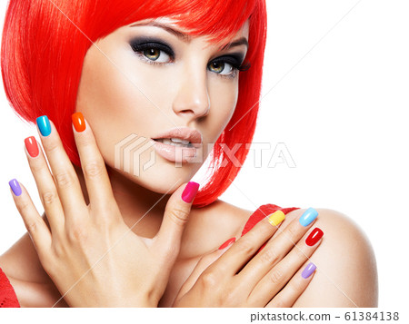 Face of a beautiful  girl with brown eye makeup 61384138