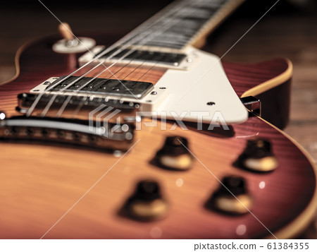 Old Vintage electric guitar body close-up view Old Vintage electric guitar body close-up view 61384355