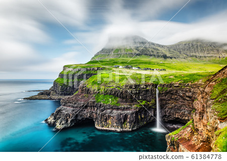 Mulafossur waterfall in Gasadalur, Vagar Island of the Faroe Islands Mulafossur waterfall in Gasadalur, Vagar Island of the Faroe Islands 61384778