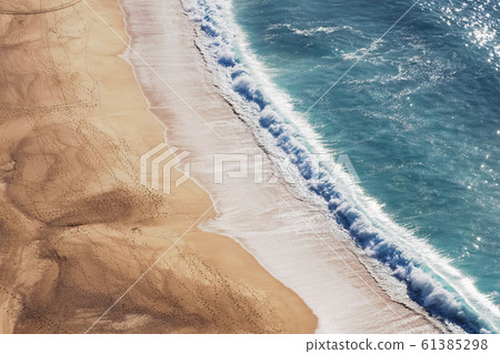 Top view of beautiful empty sand beach Top view of beautiful empty sand beach 61385298