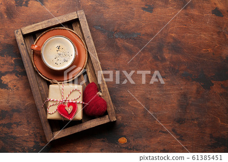 Valentines day card with gift and coffee cup Valentines day card with gift and coffee cup 61385451