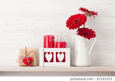 Valentines day card with gift and flowers Valentines day card with gift and flowers 61385453