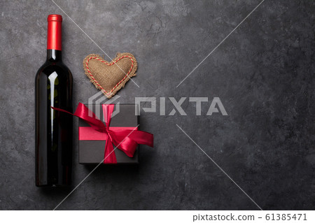 Valentines day card with wine and gift box Valentines day card with wine and gift box 61385471