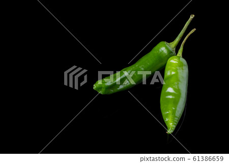 Green hot chilli peppers. Green hot chilli peppers. 61386659