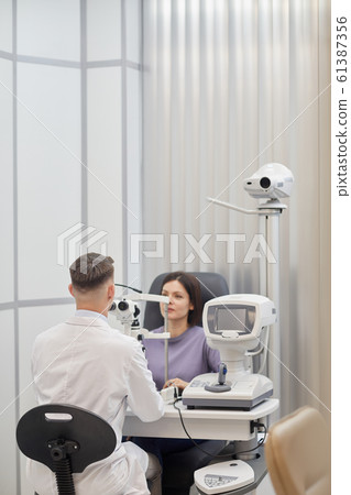Young Woman in Opthalmology Clinic Young Woman in Opthalmology Clinic 61387356