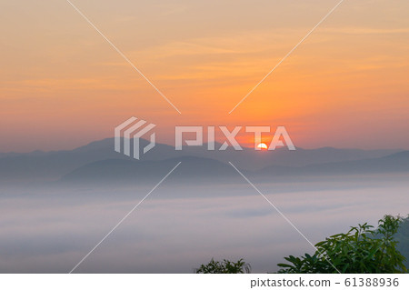 Silhouette the sunrise with the fog, beautiful sky and cloud at Phu Lam Duan Mountain, Pak Chom District, Loei Province, Thailand. Silhouette the sunrise with the fog, beautiful sky and cloud at Phu Lam Duan Mountain, Pak Chom District, Loei Province, Thailand. 61388936