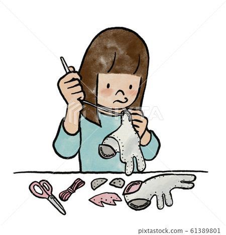 Girl sewing 61389801