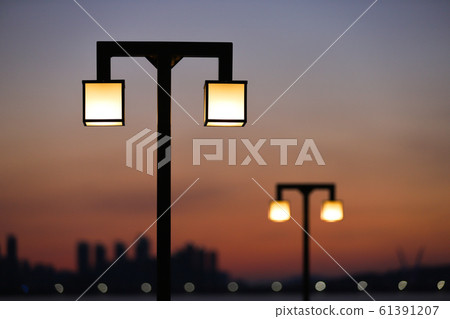 Sunset on the seaside street lights 61391207