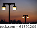 Sunset on the seaside street lights 61391209